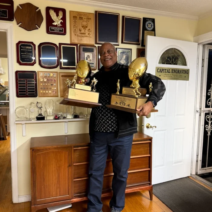 Two Capital Beltway League championship trophies