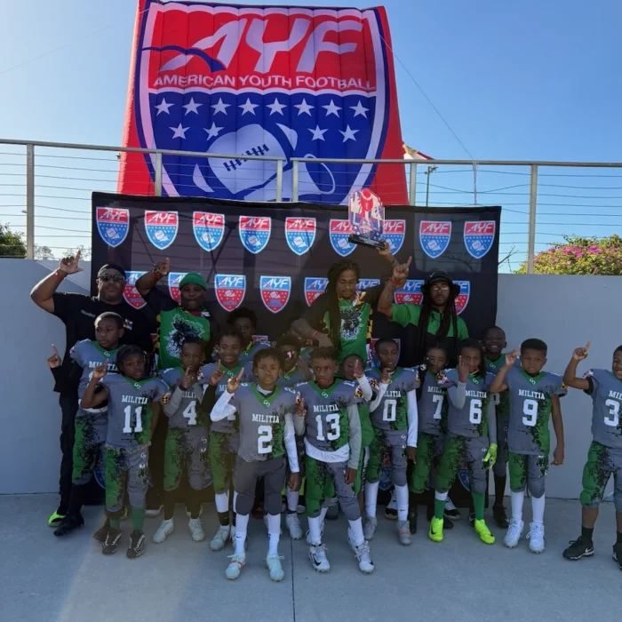 CBL team photo in front of the AYF banner